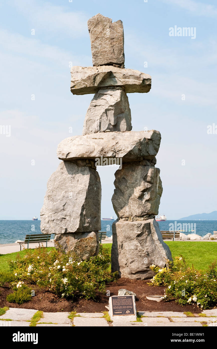 Inukshuk, traditional Inuit landmark and navigation aid, near English Bay, Vancouver, Canada.  Constructed by Alvin Kanak, 1986. Stock Photo
