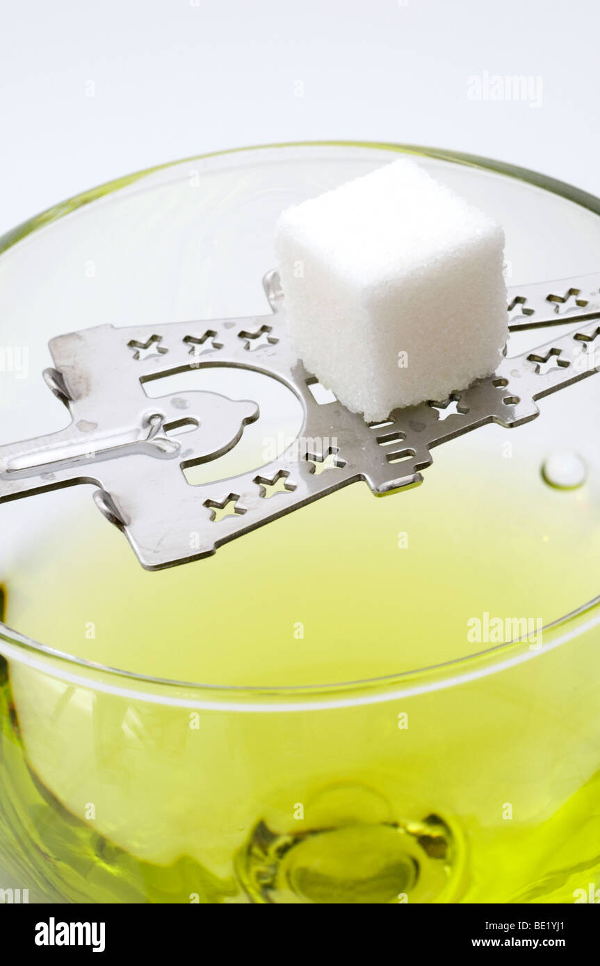 Absinthe with Stir Spoon and Sugar Cube Stock Photo
