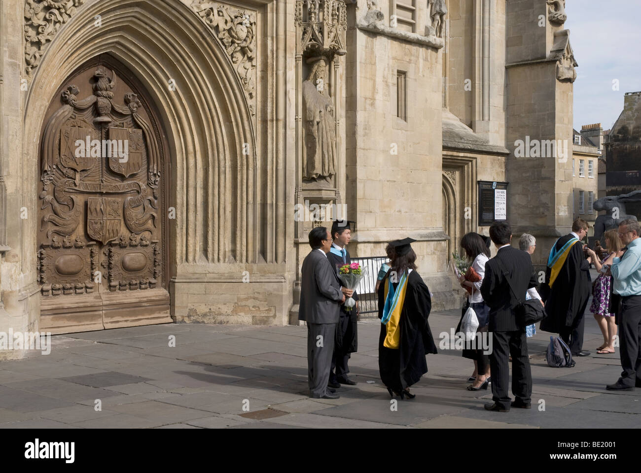 The Abbey on the students of Bath University graduation day, Bath Abbey, Bath Spa Somerset UK