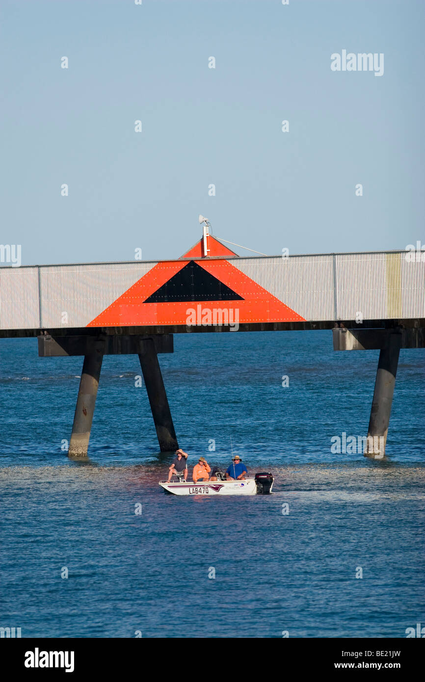 Fishermen sinking a line beneath Lucinda Jetty, the southern hemisphere