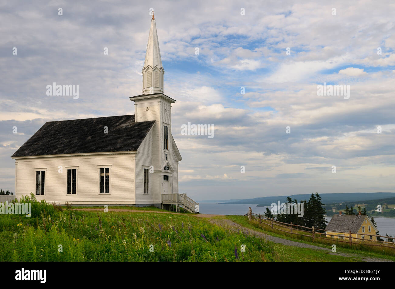 Historic church at Highland Village Museum Iona with Great Bras d'Or Lake Cape Breton Island Nova Scotia Canada Stock Photo