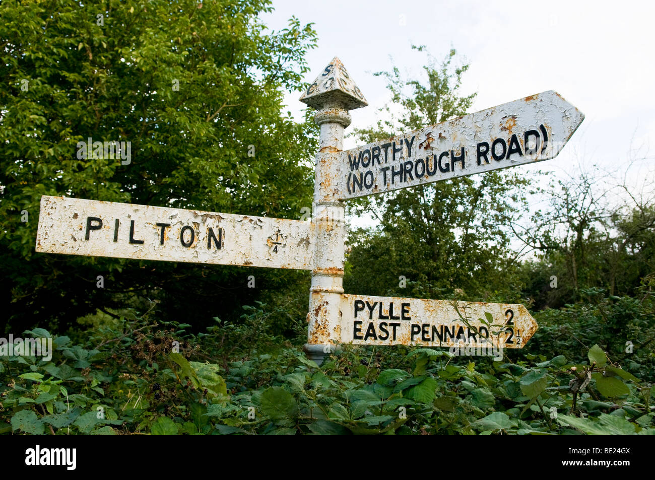 Country road sign in Pilton, Somerset, pointing to Worthy, where the Glastonbury Festival is sited each June. Stock Photo