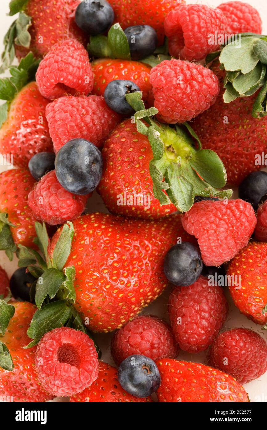 Strawberries, blueberries and raspberries Stock Photo