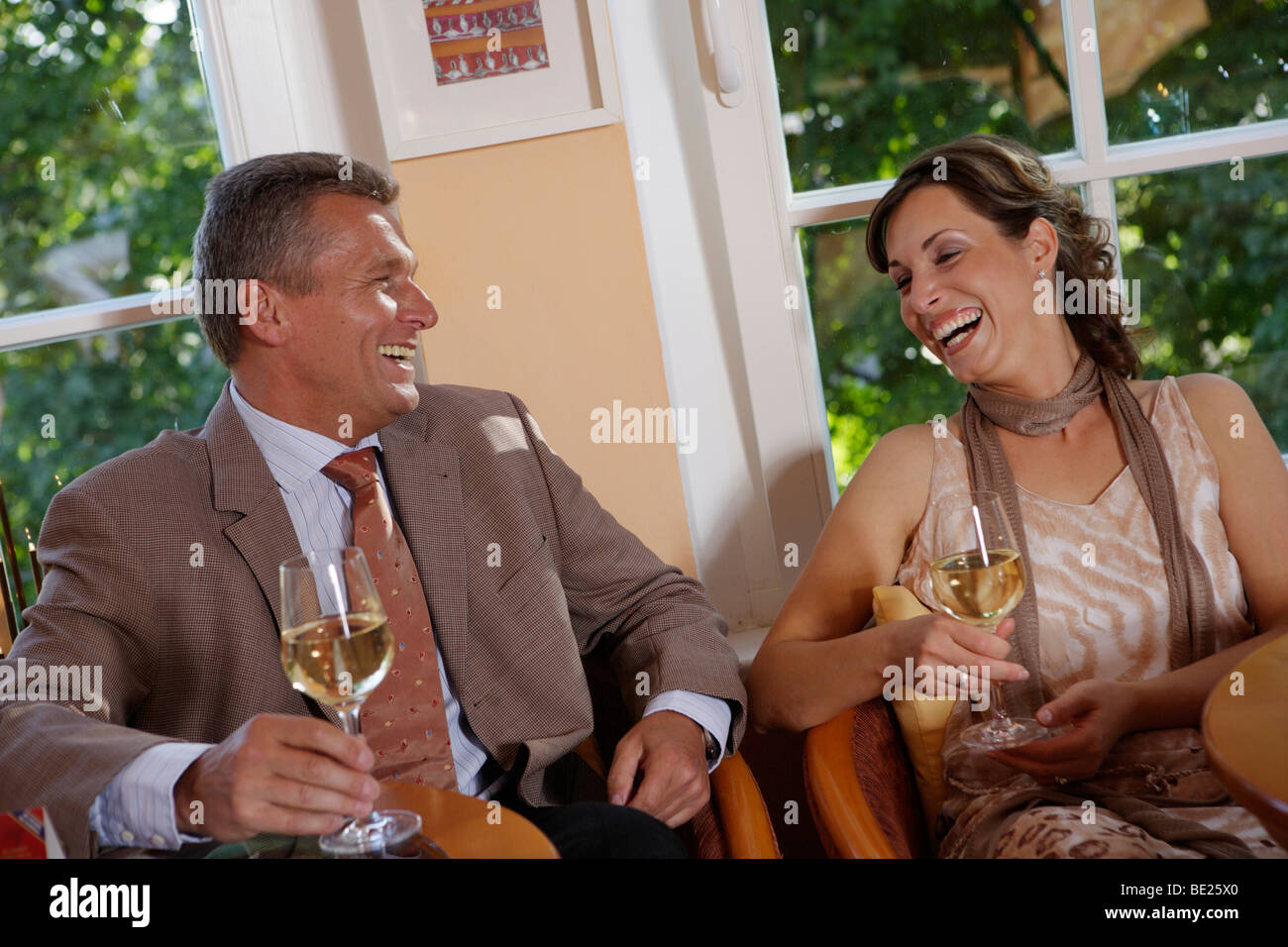 Couple holding a wine glass Stock Photo