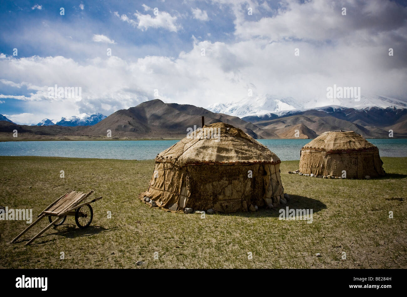 Kyrgyz yurts on the northern edge of Lake Kara Kul in western China. Stock Photo