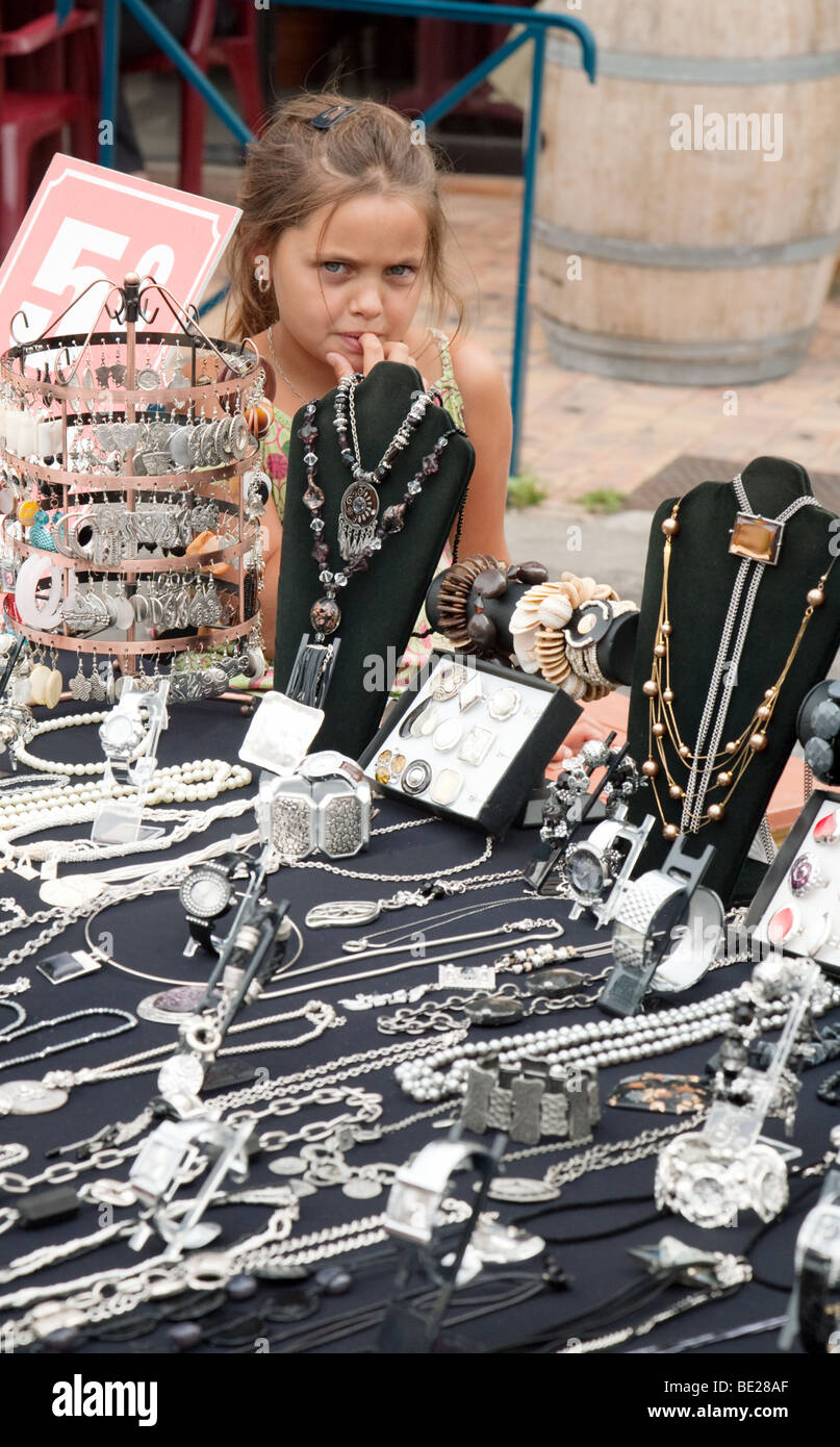 A child shopping in the market in the town of Nerac, Aquitaine, France Stock Photo