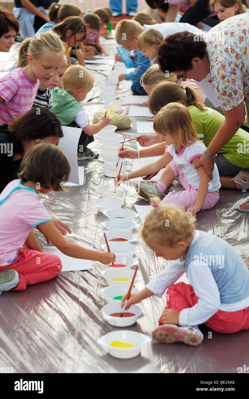 Children are having fun painting pictures Stock Photo