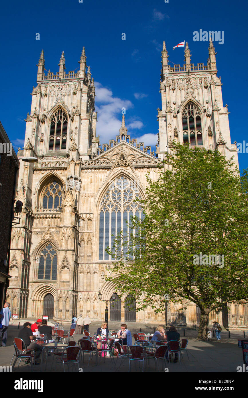 Sitting outside a cafe near York Minster York Yorkshire England Stock