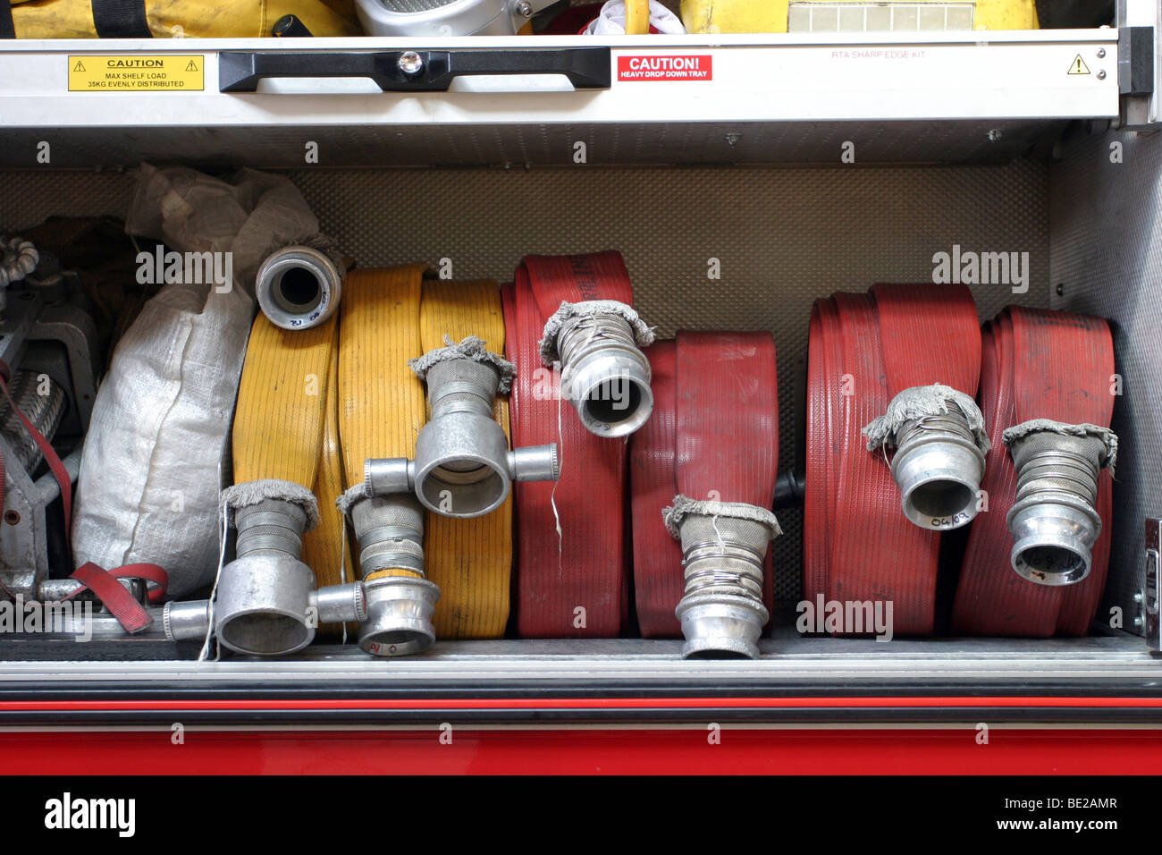 Hoses inside a fire engine Stock Photo Alamy
