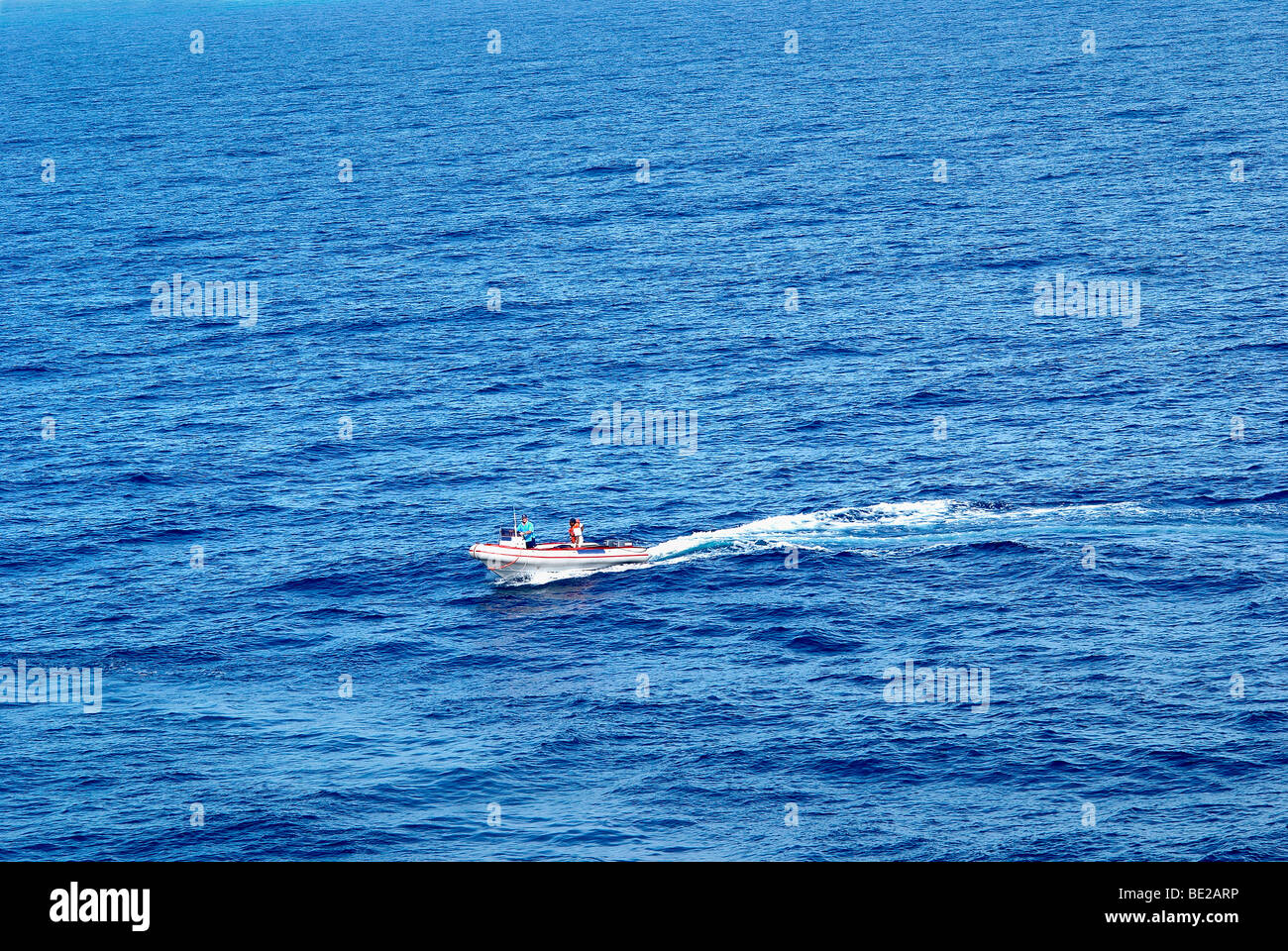 Boat, speed boat, rubber duck, rubber dinghy, sea, mozambique coast, blue sea, ocean, barra lodge, blue ocean Stock Photo