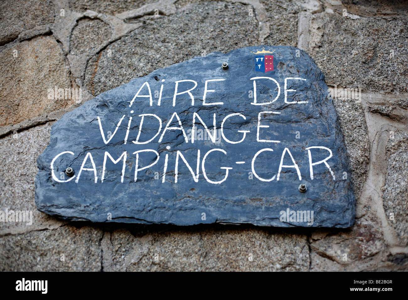 A sign for an aire de vidange camping car or campervan service area in Mont-Louis in the Pyrenees in France Stock Photo