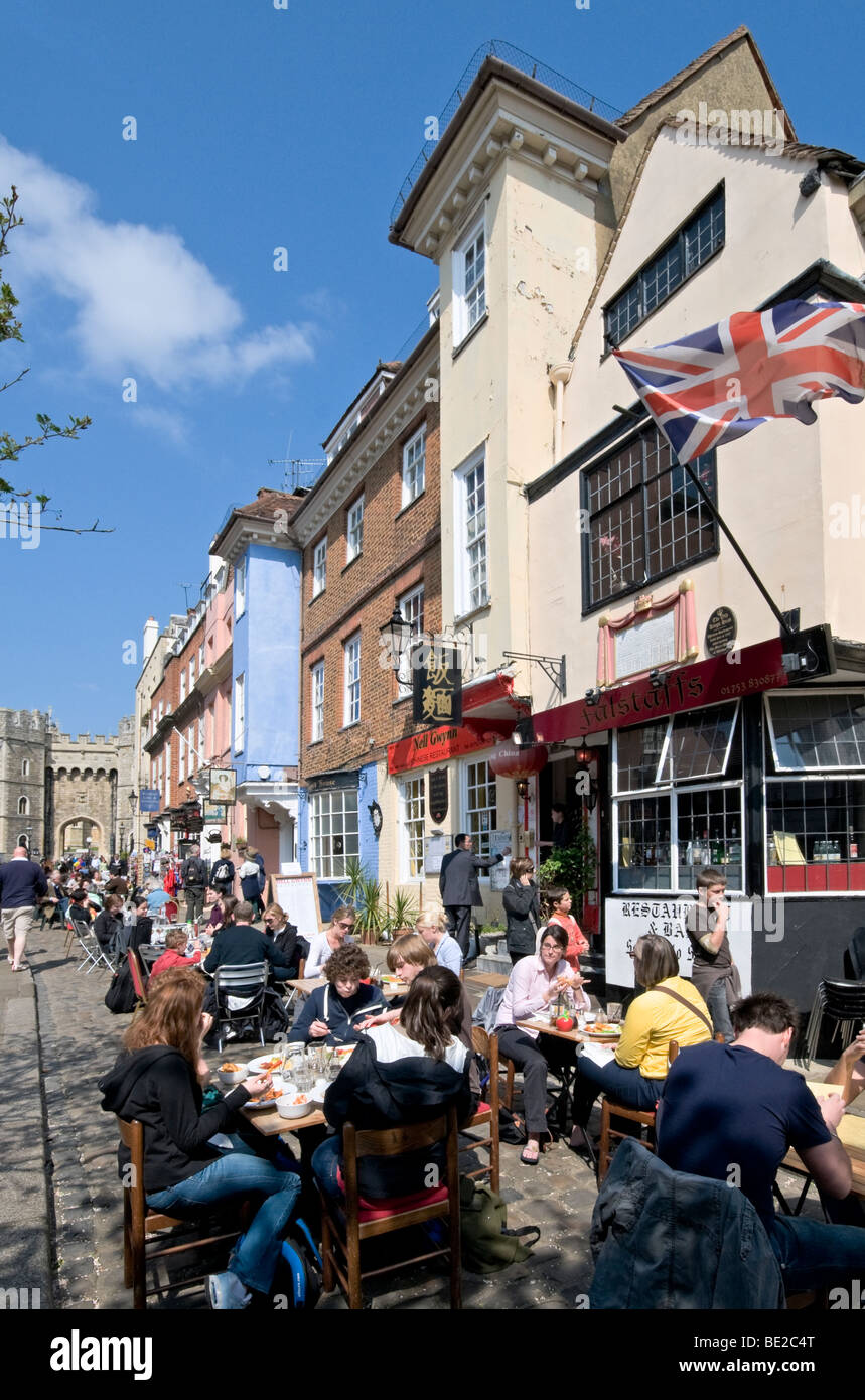 People eating in the open, Church Street, Windsor, Berkshire, England Stock Photo