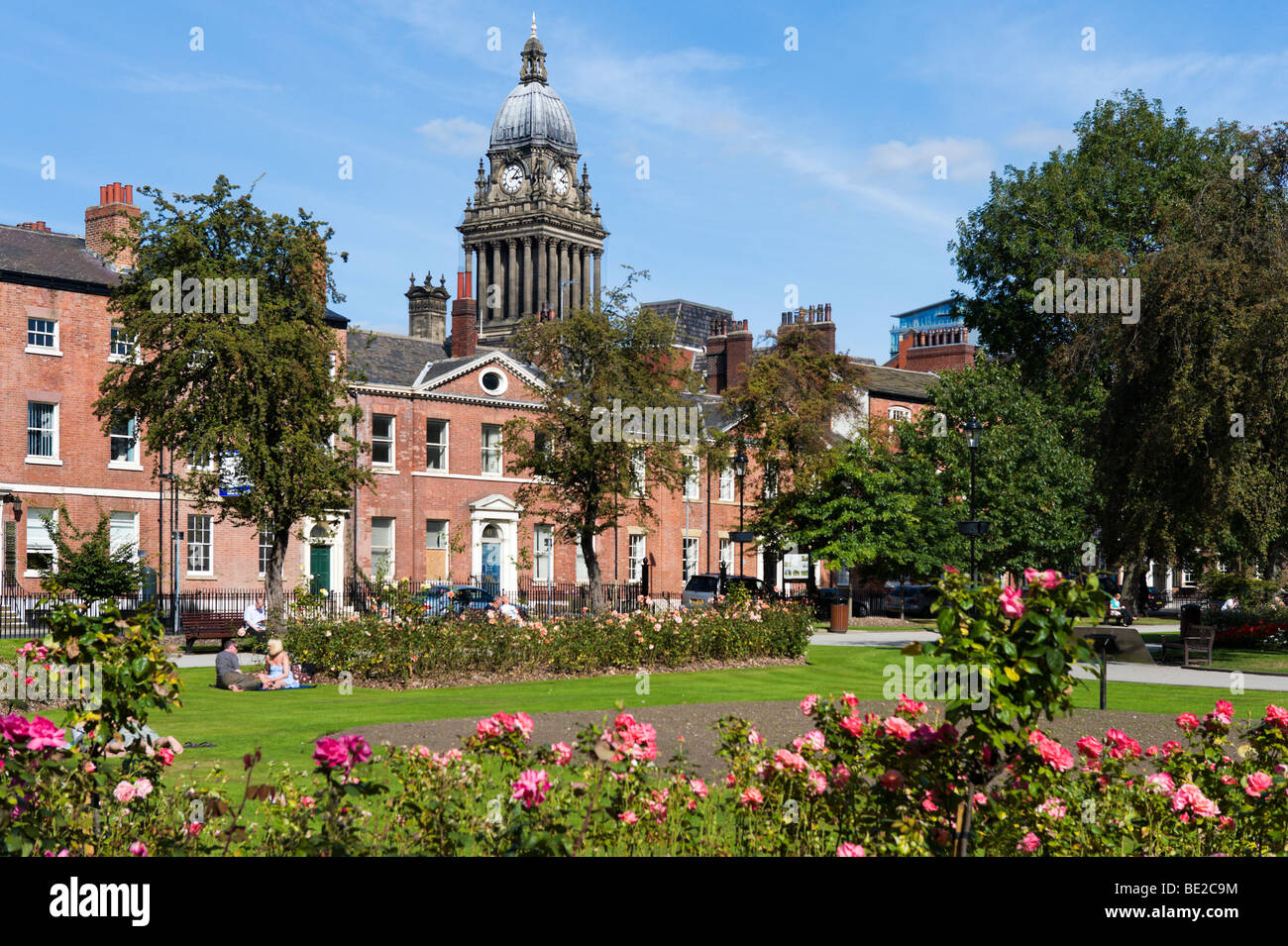 Park Square with the Town Hall clock tower behind, Leeds, West Yorkshire, England Stock Photo