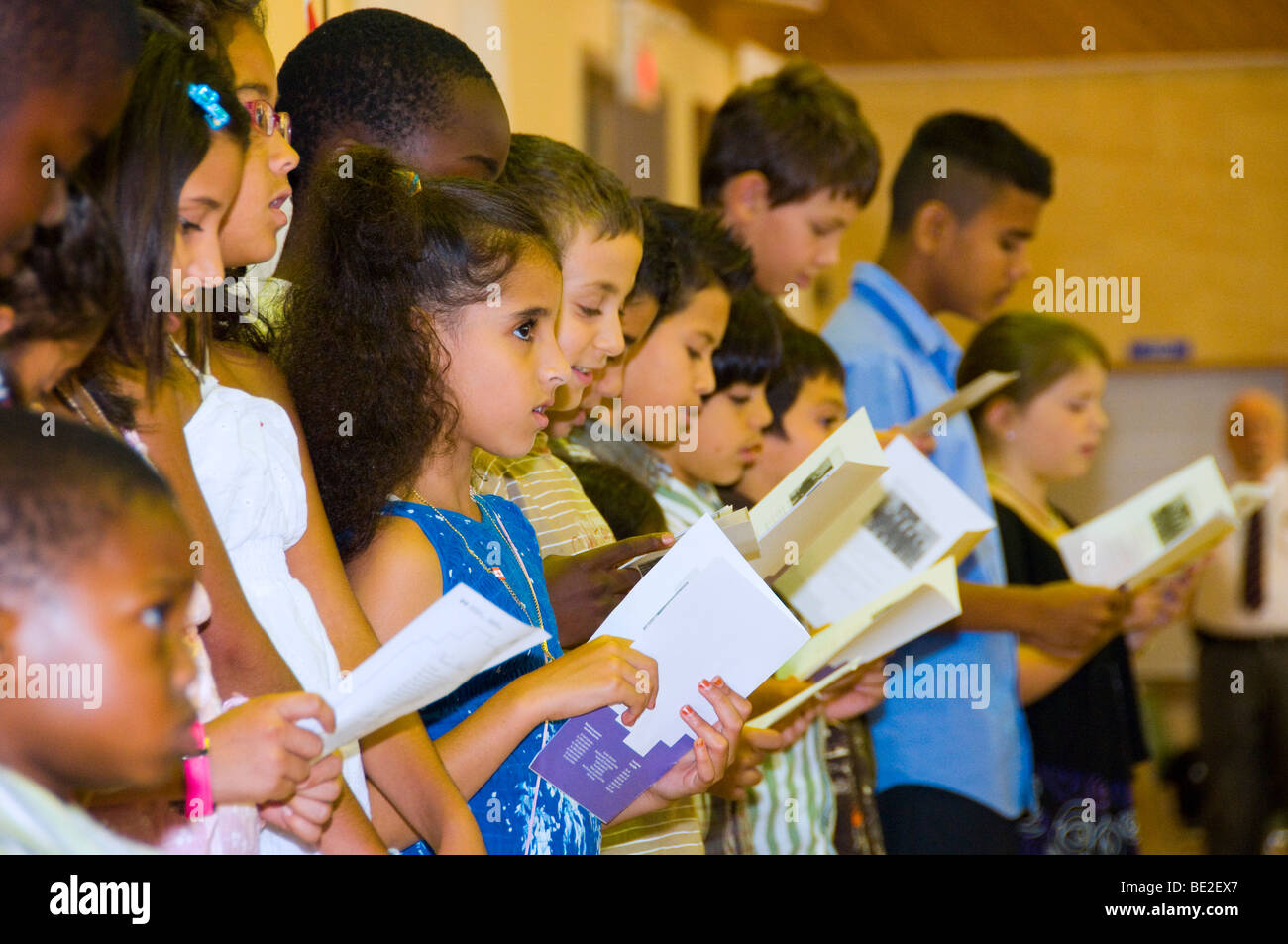 Canadian children singing the national hymn Stock Photo
