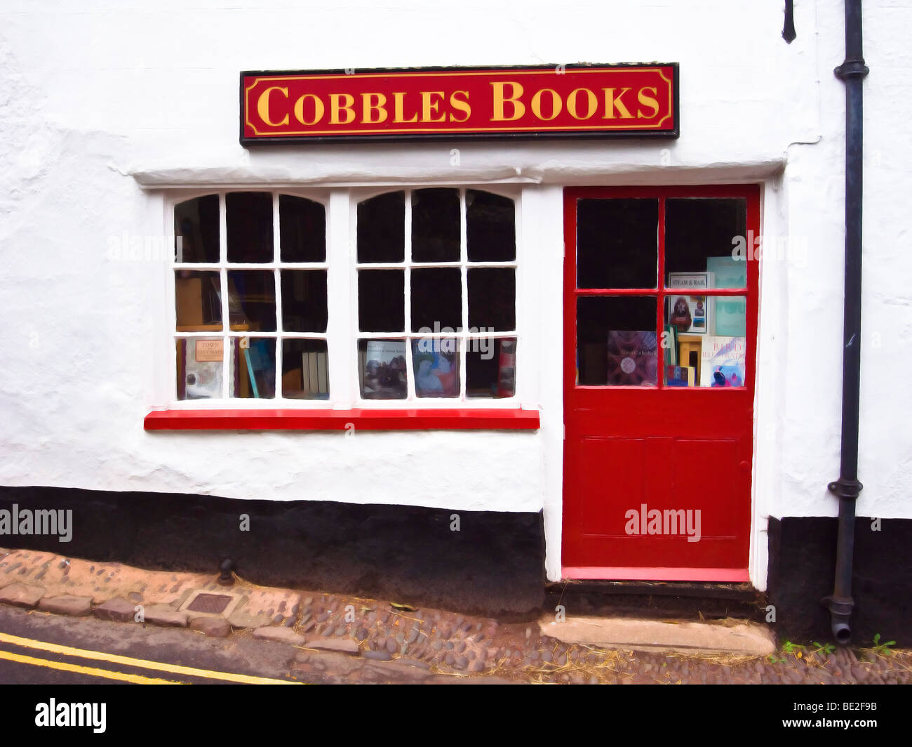 Small book shop in Dunster village Somerset UK Stock Photo