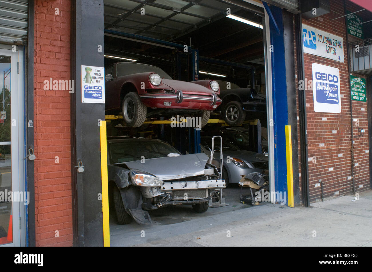 Cars in an auto repair shop in the Brooklyn Heights neighborhood of