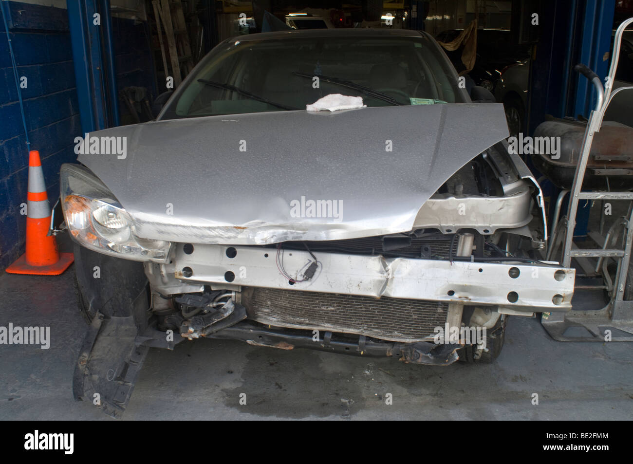 Cars in an auto repair shop in the Brooklyn Heights neighborhood of ... - Cars In An Auto Repair Shop In The Brooklyn Heights NeighborhooD Of BE2FMM