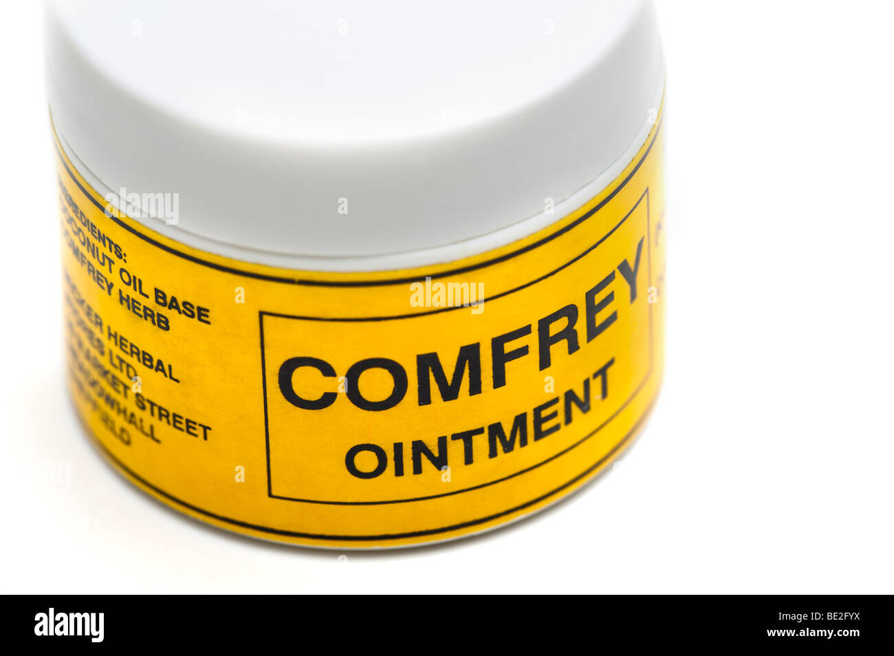 white plastic tub of Comfrey ointment Stock Photo