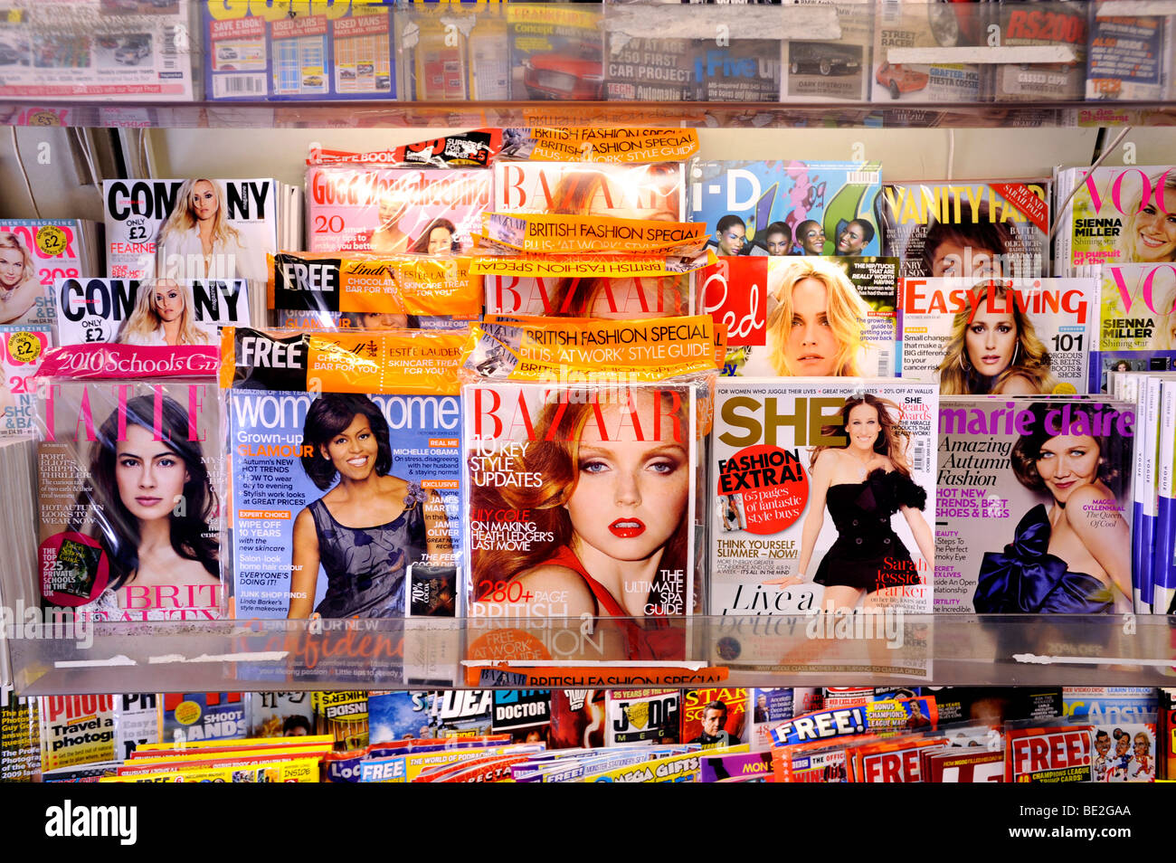 Magazines on a stand in a newsagents Stock Photo Alamy