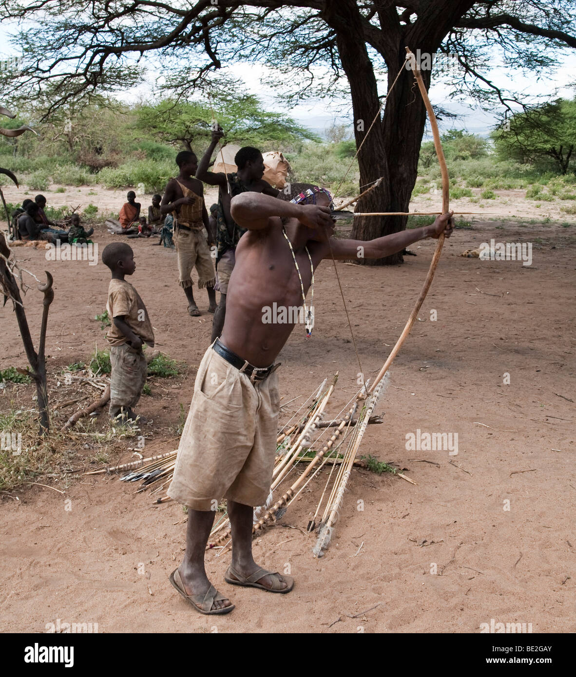 Hadzabe man practicing archery Stock Photo