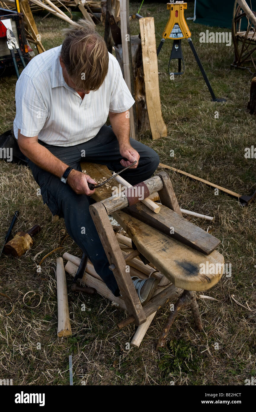 A woodworker demonstrating the use of a draw knife and a shaving horse at the Essex County Show.  .  Photo by Gordon Scammell Stock Photo