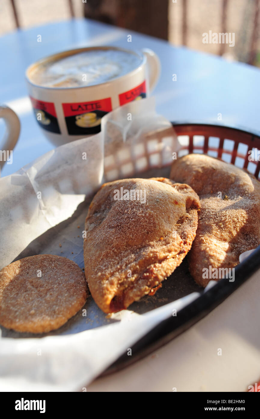 USA, Albuquerque, New Mexico- empanadas and latte coffee at the Golden Crown Bakery in Old Town Stock Photo