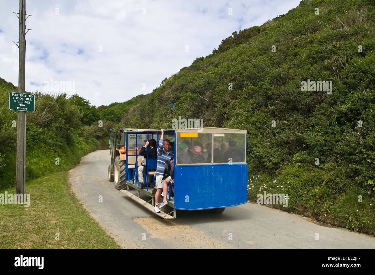 dh Harbour Hill MASELINE HARBOUR SARK ISLAND Tractor and passenger