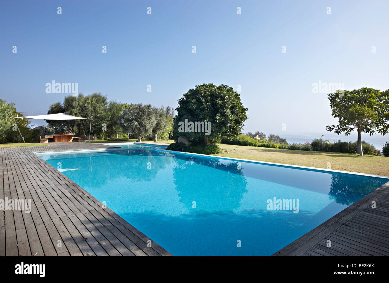 swimming pool garden Aegean blue sky Stock Photo