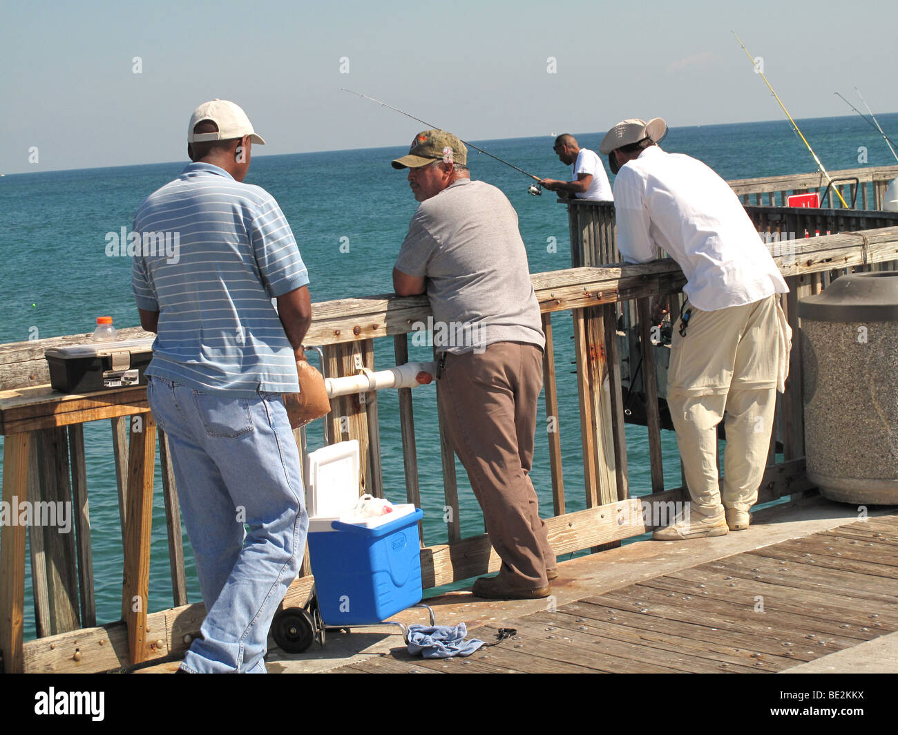 Men fishing on Pompano Beach pier Stock Photo Alamy