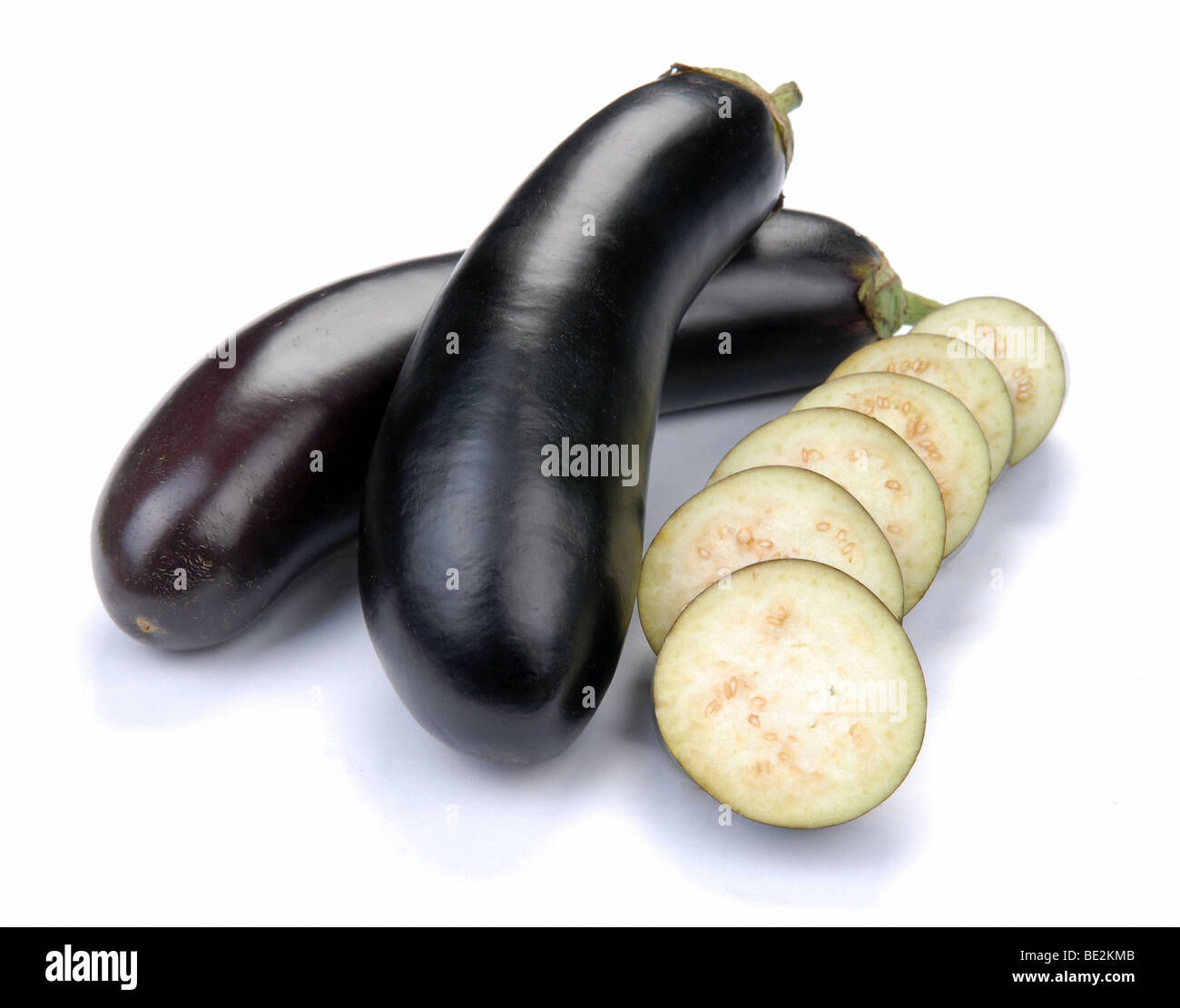 aubergine and slices on a white background Stock Photo