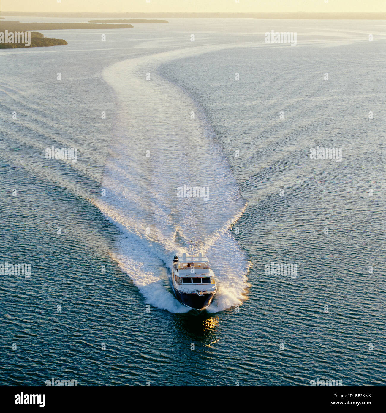 Power boat moving through water Stock Photo Alamy