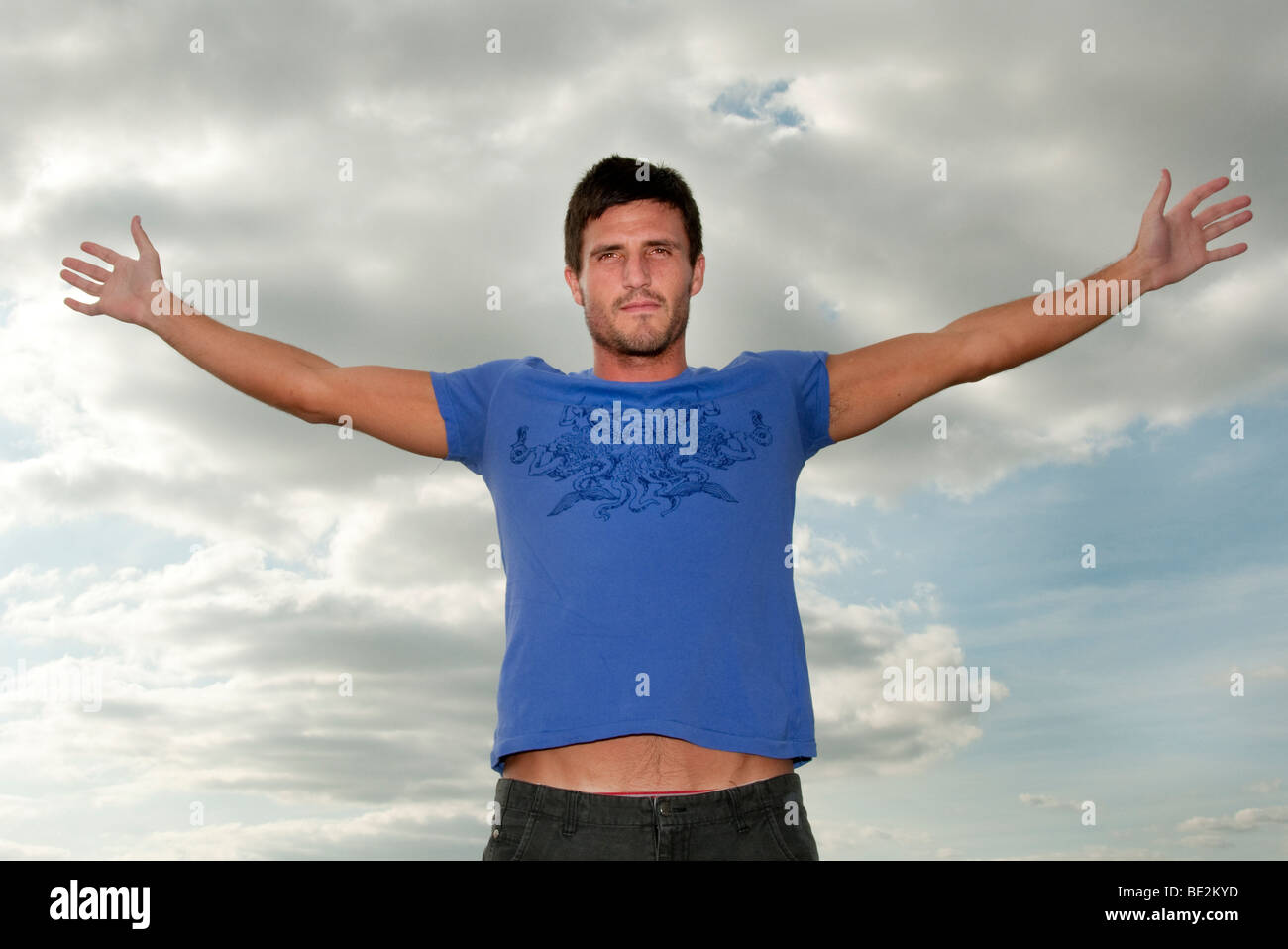 Man standing arms stretched out hires stock photography and images Alamy