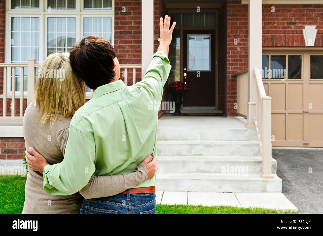 Female couple hugging home hi-res stock photography and images - Alamy