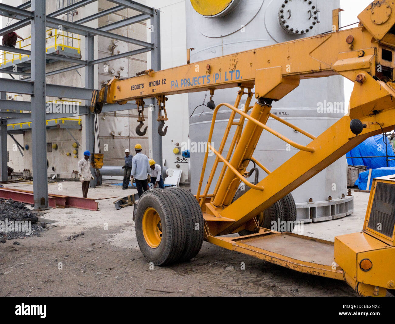 Mobile crane at an Indian construction site / factory building in an industrial area of India