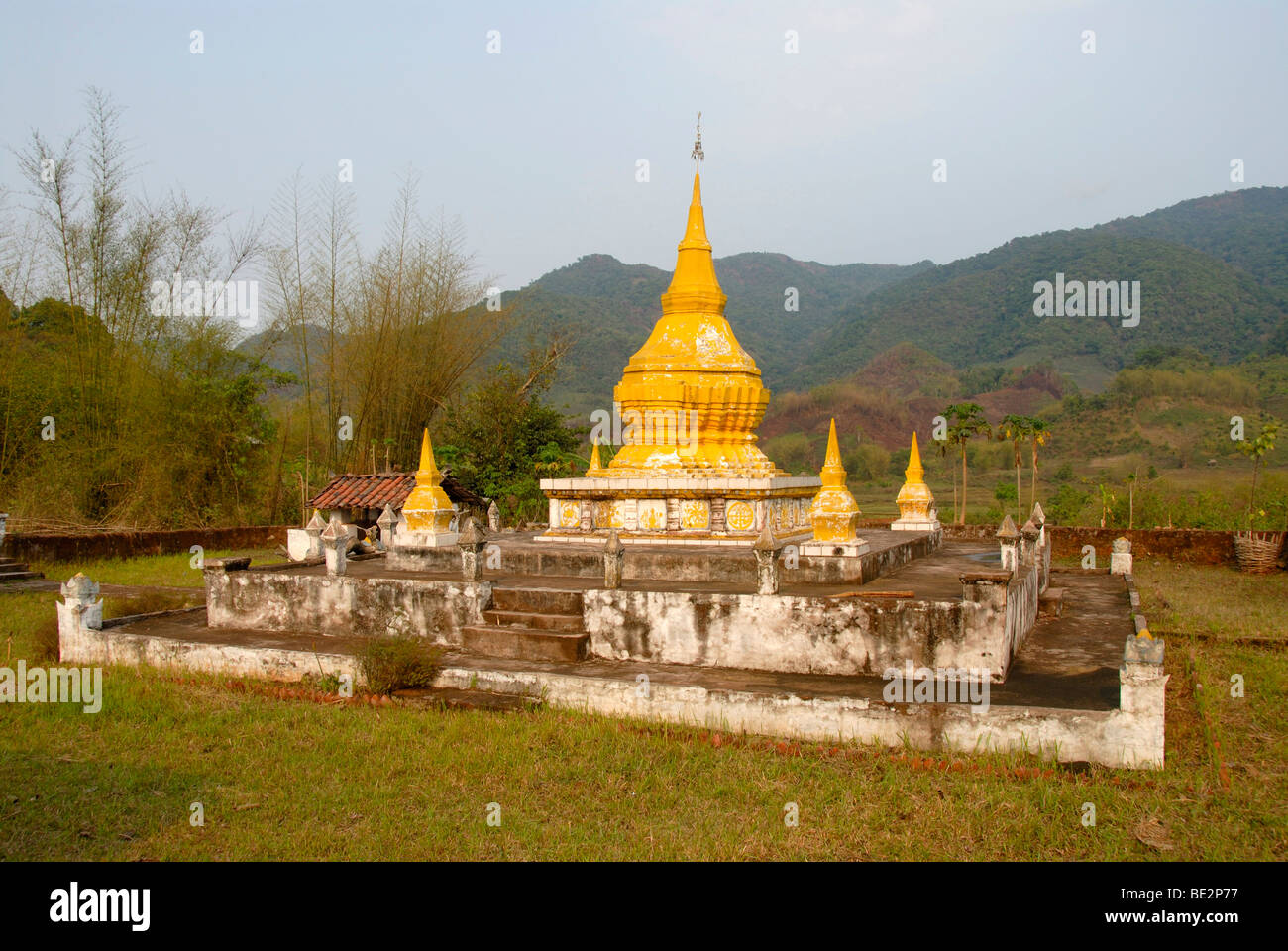 Theravada Buddhism, yellow stupa, That Hu Muang, Ou Tai, Gnot Ou district, Yot Ou, Phongsali province, Phongsaly, Laos, Southea Stock Photo