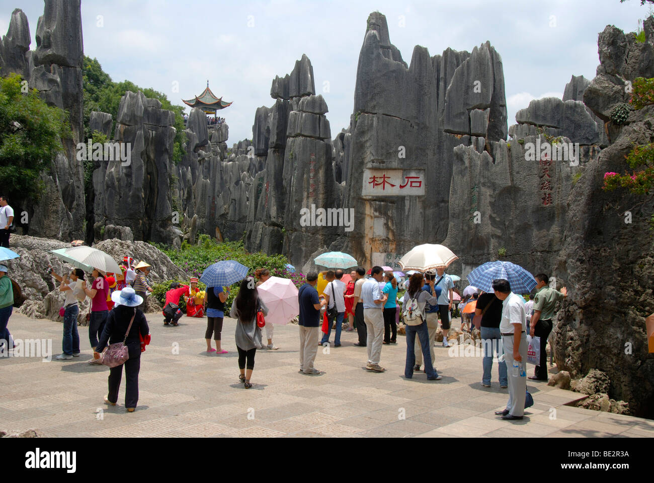 UNESCO World Heritage Site, many Chinese tourists, sculpture-like rocks with gazebo, karst landscape, Shilin Stone Forest, Yunn Stock Photo