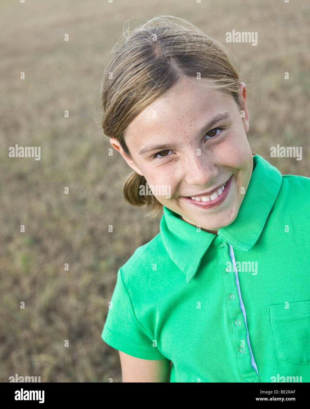 Portrait of a smiling brown-haired girl Stock Photo