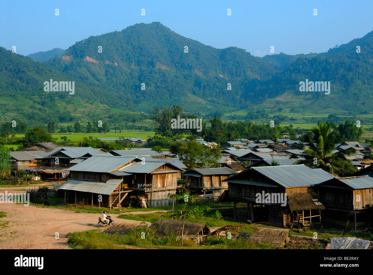 Village with huts made of wood and corrugated iron roofs in a valley, Ou Tai, Gnot Ou district, Yot Ou, Phongsali, Phongsali pr Stock Photo