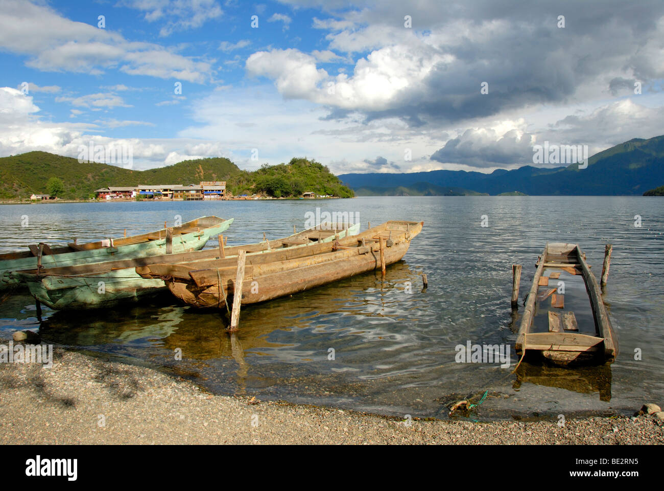 Old wooden boats on the shore, Lige, Lugu Hu Lake, Yunnan Province, People's Republic of China, Asia Stock Photo