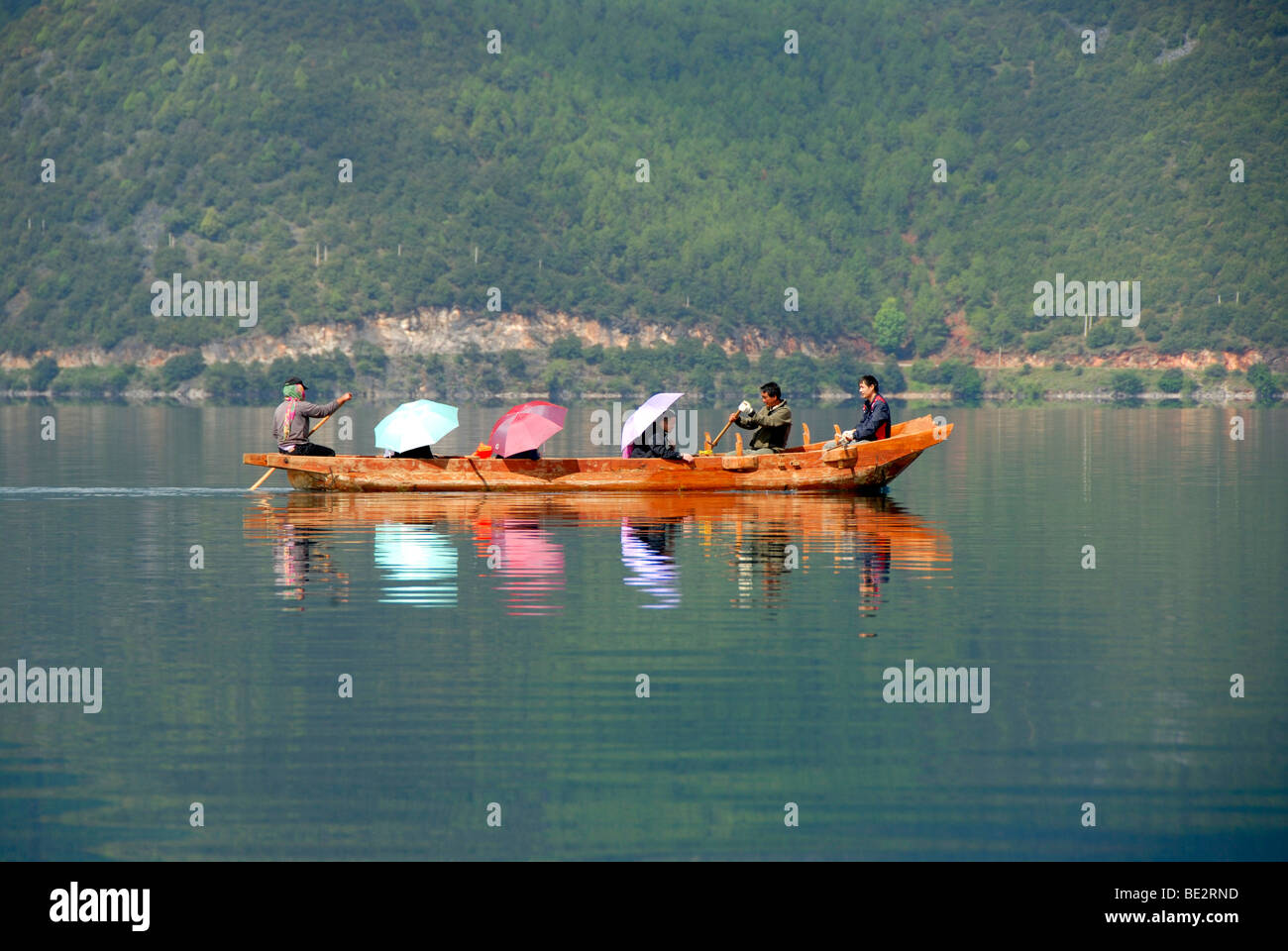 Tourism, Chinese tourists, excursion by rowboat, Lugu Hu Lake, Yunnan Province, People's Republic of China, Asia Stock Photo