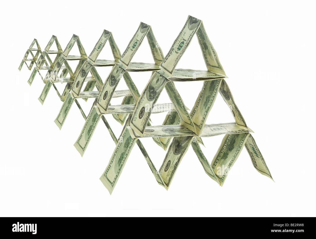 Six pyramids made out of one hundred dollar bills. Stock Photo