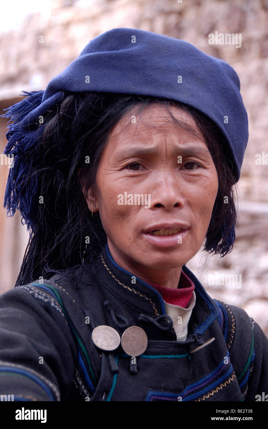 Portrait, ethnology, woman of the Hani ethnic group, dark clothes, near Xinji, Yuanyang, Yunnan Province, People's Republic of  Stock Photo