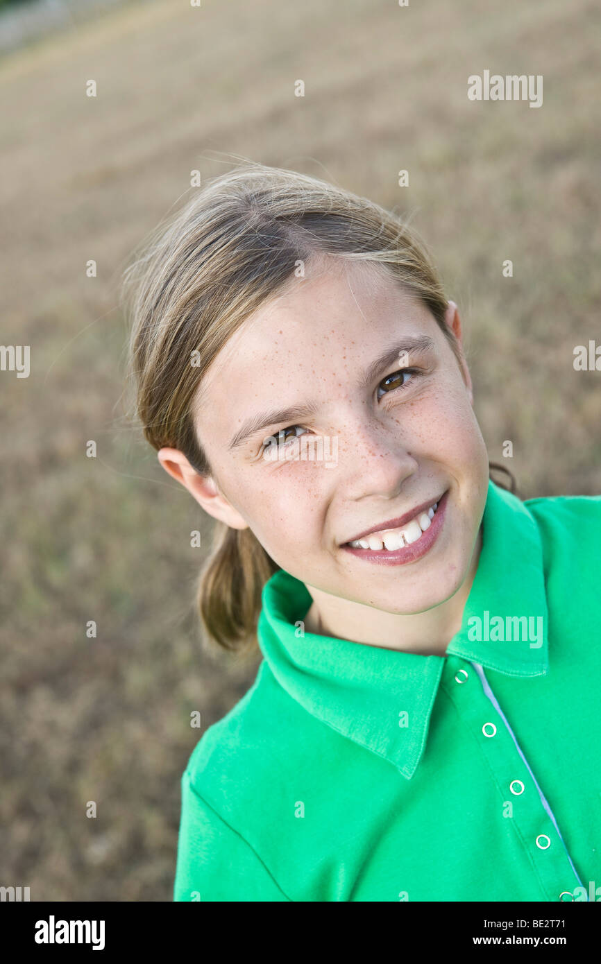 Portrait of a smiling brown-haired girl Stock Photo