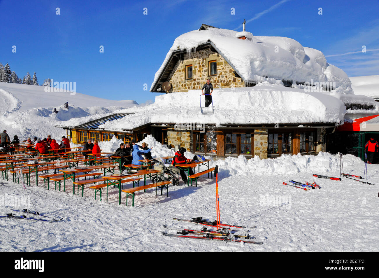 Ski hut Tressdorfer Alm with beer benches in the sun, Tressdorfer Hoehe, Nassfeld, Hermagor, Carinthia, Austria, Europe Stock Photo