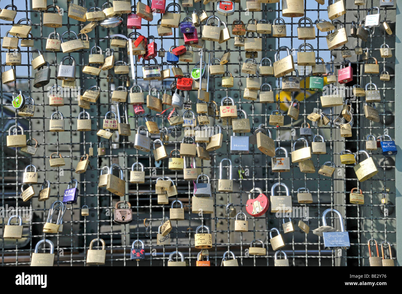 Padlocks as a sign of friendship and love at the metal fence of the ...