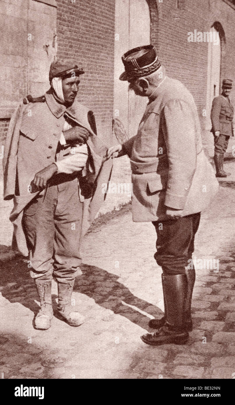 General Joffre sympathizing with one of his wounded soldiers during World War I. Stock Photo