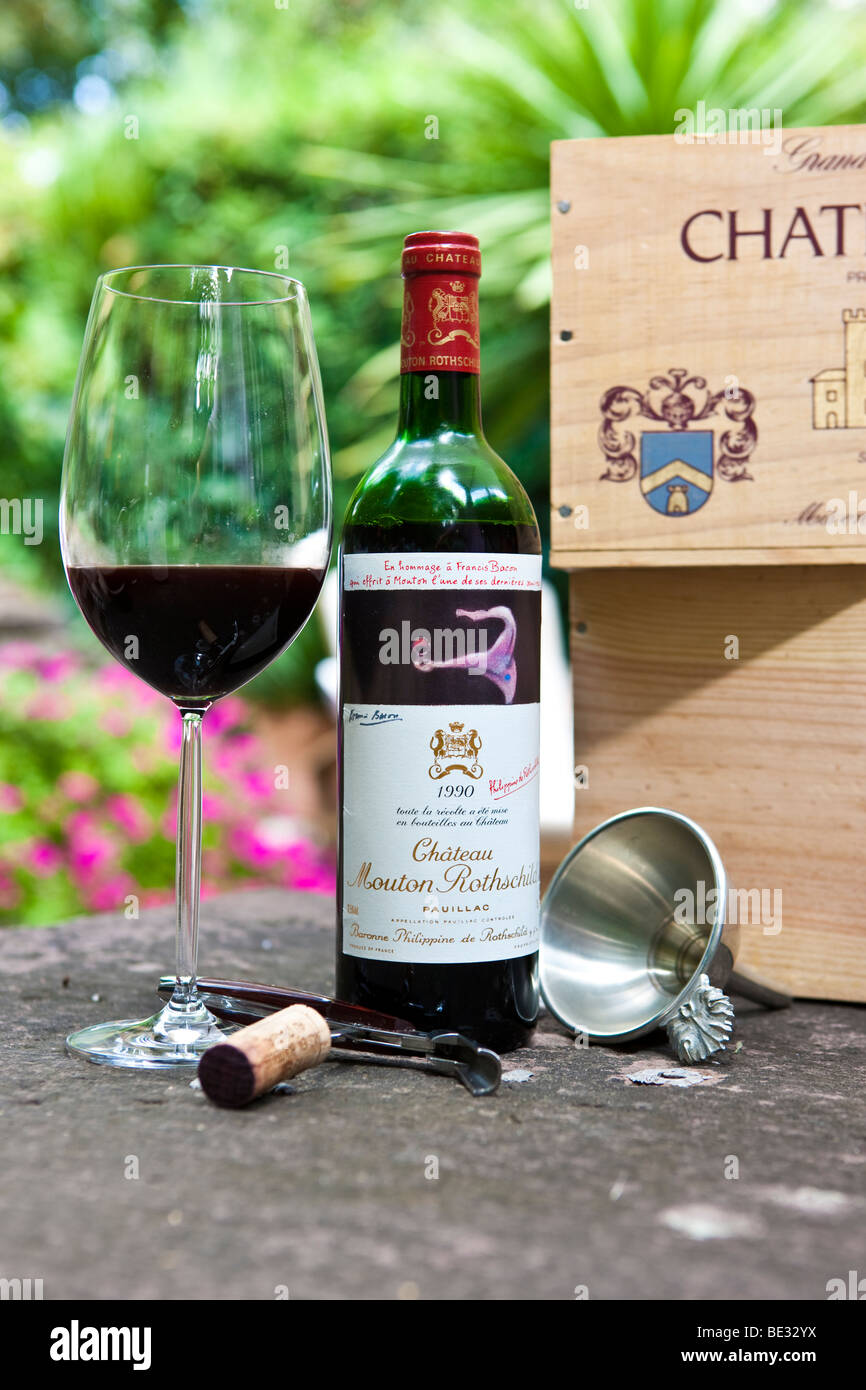 Chateau Mouton Rothschild 1er Cru Classe Pauillac Grand Vin de Bordeaux, Bordeaux glass, cork, sommelier cutlery Stock Photo