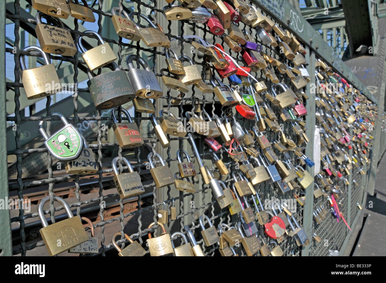 Padlocks as a sign of friendship and love at the metal fence of the ...