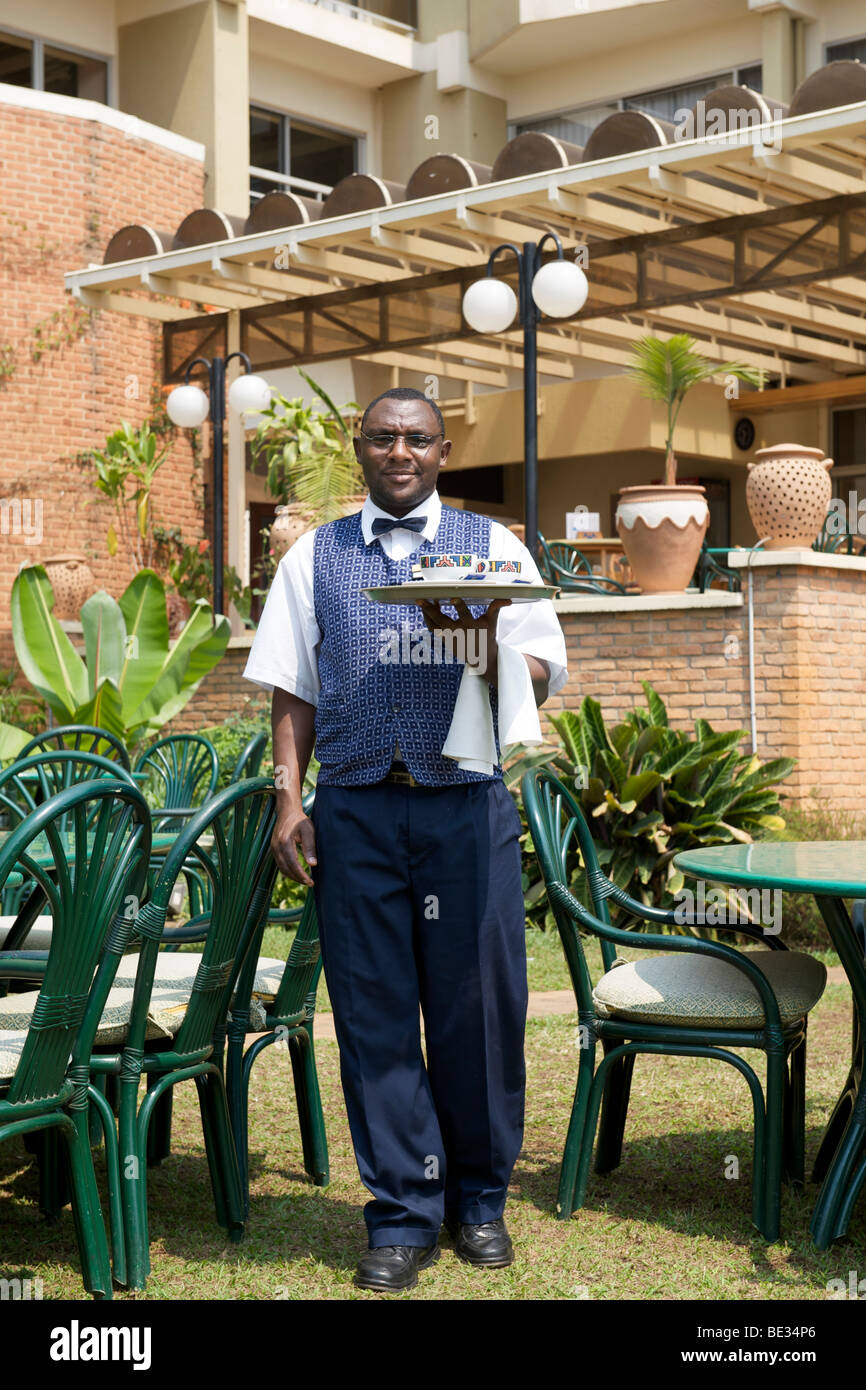 Waiter at the Hotel Mille Collines in Kigali, Rwanda. It is the setting of the movie Hotel Rwanda. Stock Photo