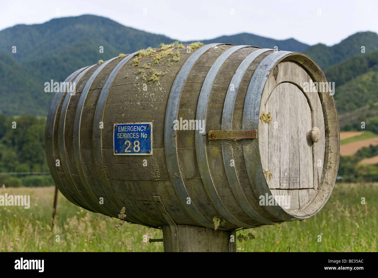 Wooden wine barrel converted into a post box, Mangles Valley, South Island, New Zealand Stock